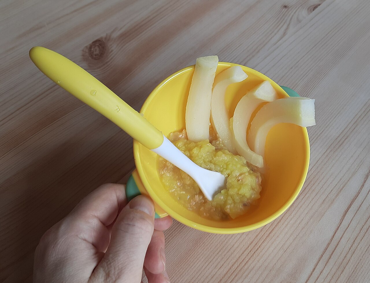 Starting solids - homemade baby food in a bowl